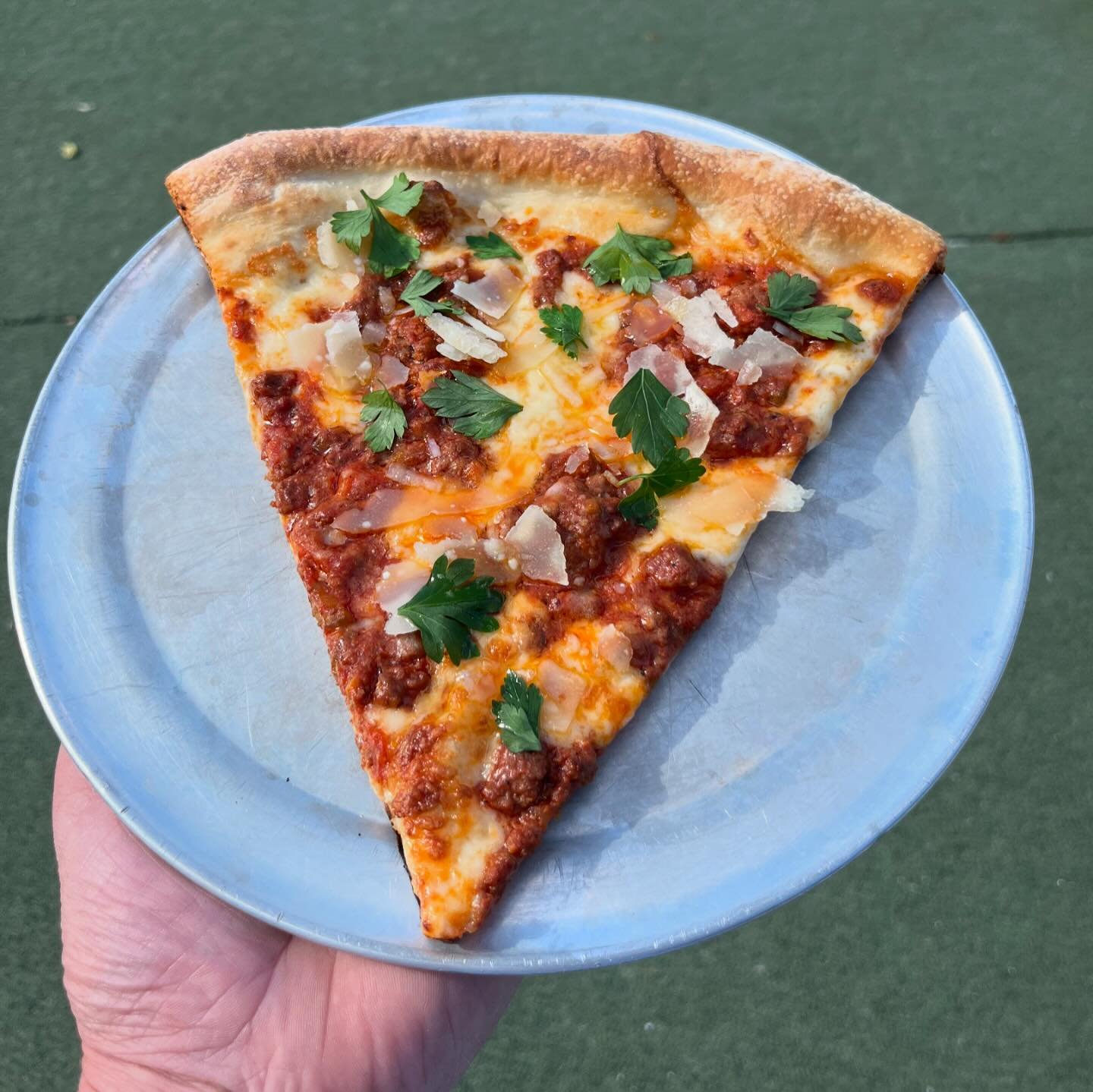 Pizza Lobo — Logan Square — photograph from the credited source